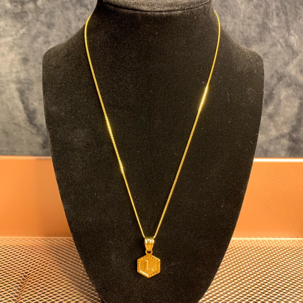 Necklace with letter pendant